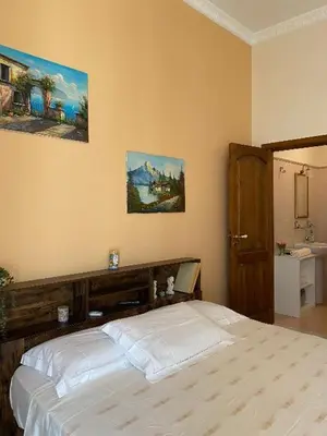 Letto o letti in una camera di B&B L' Aquila dell' Etna
