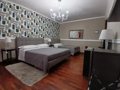 Letto o letti in una camera di La Suite del Vulcano