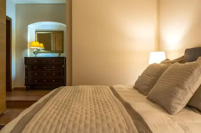 Letto o letti in una camera di Villa Battiato . Home n Pool