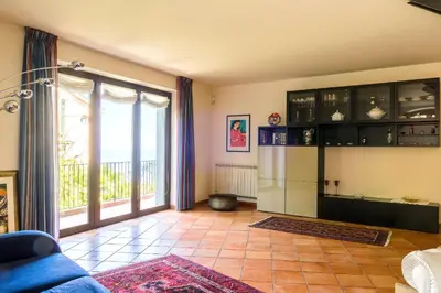 Area soggiorno di Villa Battiato . Home n Pool