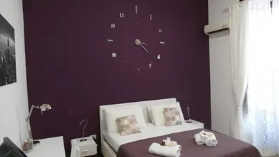 Letto o letti in una camera di B&B Fusorario