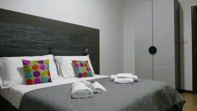 Letto o letti in una camera di B&B Fusorario