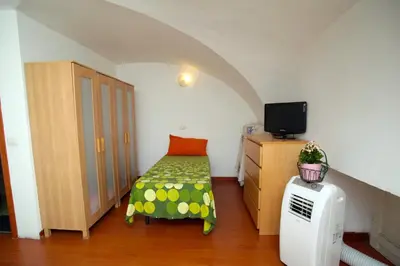 Letto o letti in una camera di La nuova locandiera