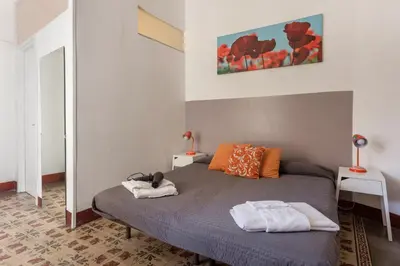 Letto o letti in una camera di Da Gianni e Lucia Rooms with bathroom in the city center