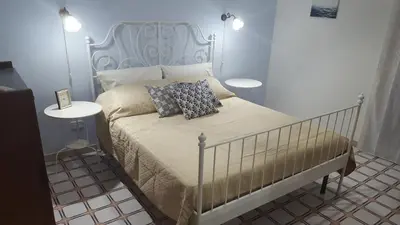 Letto o letti in una camera di Casa del Levante