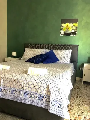 Letto o letti in una camera di Casa Aurora
