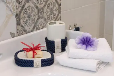 Letto o letti in una camera di Casa della Perla, Parcheggio disponibile, centrale