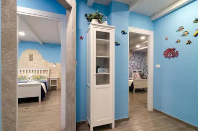 Letto o letti in una camera di Casa della Perla, Parcheggio disponibile, centrale