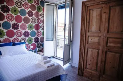 Letto o letti in una camera di Catania Charming House