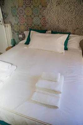 Letto o letti in una camera di Catania Charming House