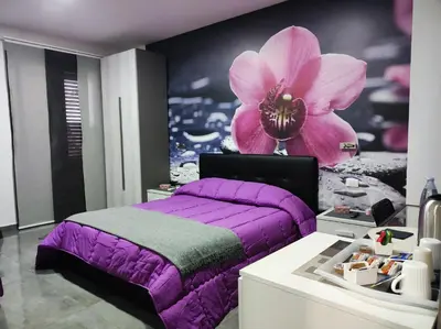 Letto o letti in una camera di B&B La Grotta