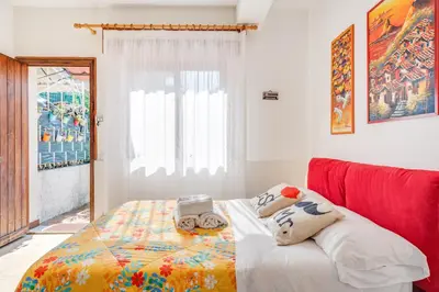 Letto o letti in una camera di Casa Scogliera