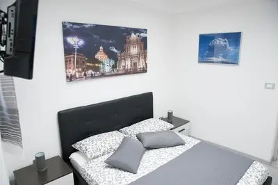 Letto o letti in una camera di Tourist's home