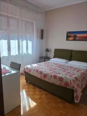 Letto o letti in una camera di La Castellese