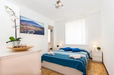 Letto o letti in una camera di SICILIA ETNA MARE Beach&Pool Catania Taormina Etna District