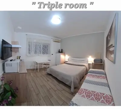 Letto o letti in una camera di Catania Home Cibali
