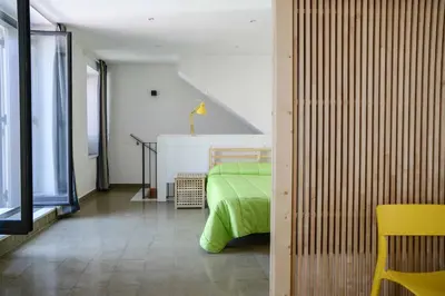 Letto o letti in una camera di Case Vacanze - Antico Corso