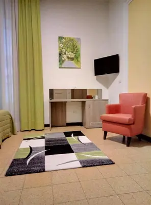 TV o dispositivi per l'intrattenimento presso Hotel Etnea Royal Suites