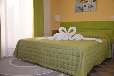 Letto o letti in una camera di Hotel Etnea Royal Suites