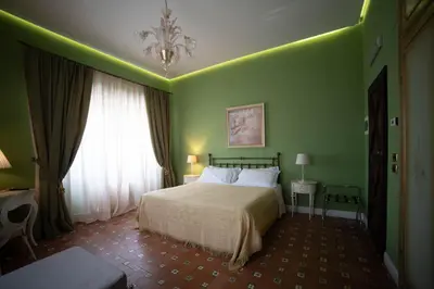 Letto o letti in una camera di Hotel Villa Dorata