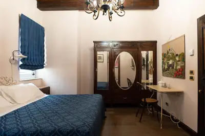 Letto o letti in una camera di Hotel Villa Dorata