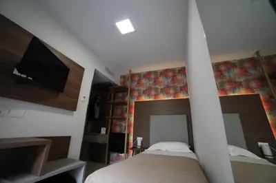 Letto o letti in una camera di 8room Hotel