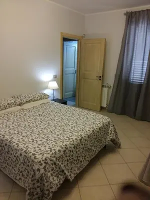 Letto o letti in una camera di B&B Lavinaio