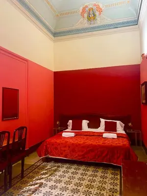 Letto o letti in una camera di Hotel Valentino