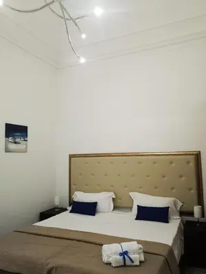 Letto o letti in una camera di Hotel Valentino