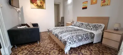 Letto o letti in una camera di Cortile Stesicoro