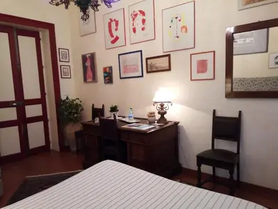 Letto o letti in una camera di A casa di Tommy B&B