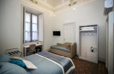 Letto o letti in una camera di Magione del Re