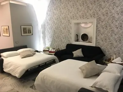 Letto o letti in una camera di Dimora del Papa