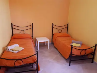Letto o letti in una camera di La Casa Dei Colori