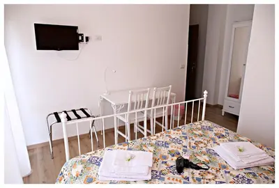 Letto o letti in una camera di Tosca B&B