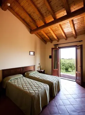 Letto o letti in una camera di La Terra Del Mezzo