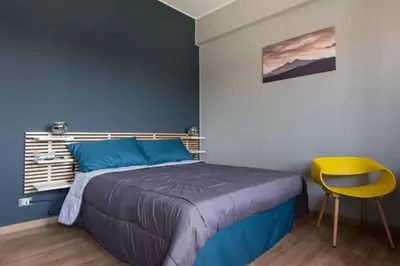 Letto o letti in una camera di Turiddu B&B