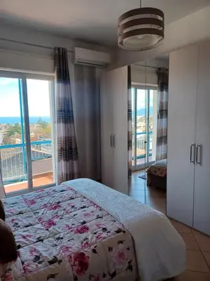 Letto o letti in una camera di Casa Donna Rosaria tra Etna e Taormina