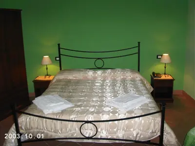 Letto o letti in una camera di La Porta Dell'Etna - Nicolosi