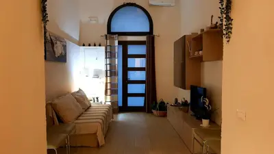 Area soggiorno di CentroCittà Suite