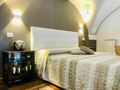 Letto o letti in una camera di Dimora Umberto Apartment