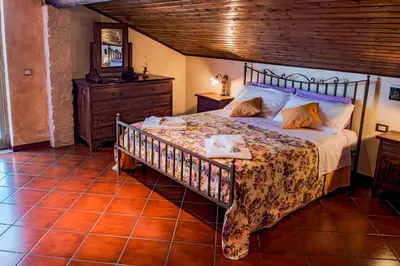 Letto o letti in una camera di B&B Alfio Tomaselli