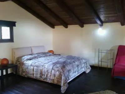 Letto o letti in una camera di Chalet Etna