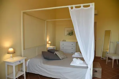 Letto o letti in una camera di Giardino Arancio