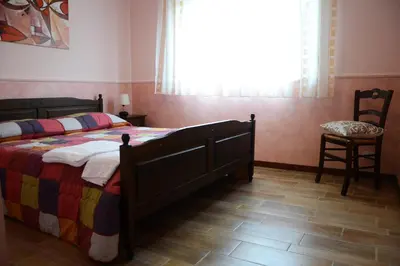 Letto o letti in una camera di B&B Notti E Dintorni