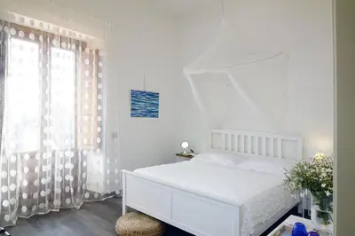 Letto o letti in una camera di La corte di Bafè B&B 