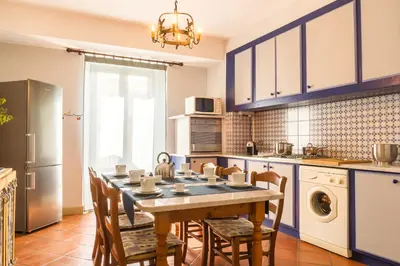 Cucina o angolo cottura di Les Suites - Apartments
