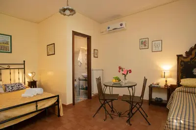 Letto o letti in una camera di Agriturismo San Leonardello