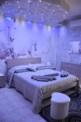 Letto o letti in una camera di Il Cuore dell'Etna