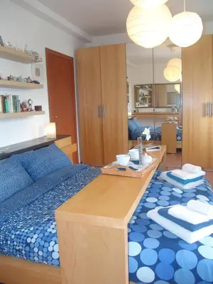 Letto o letti in una camera di Villa Muse Holiday oasi sul mare di CapoMulini, Acireale - Sicilia, Italy Locazione Turistica